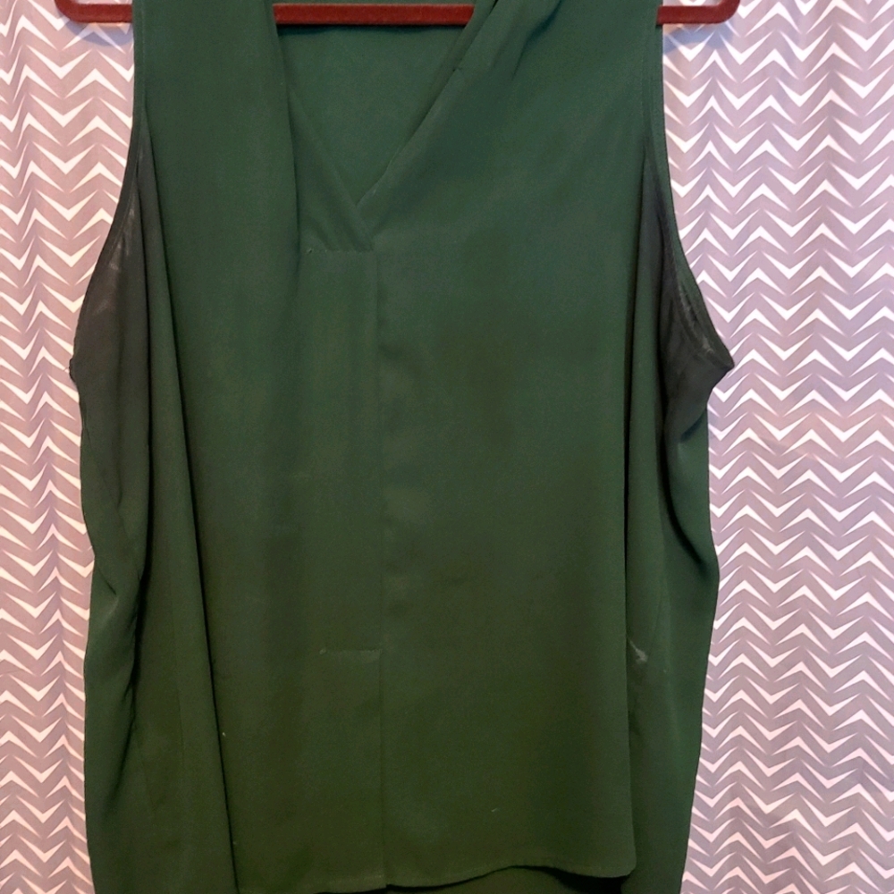 Green sleeveless blouse
